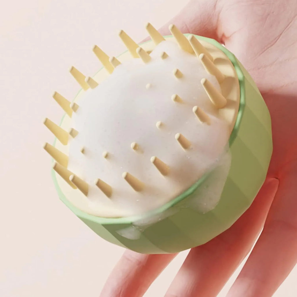 Green double-sided pet bath massage brush with drain holes for shampooing dogs and cats
