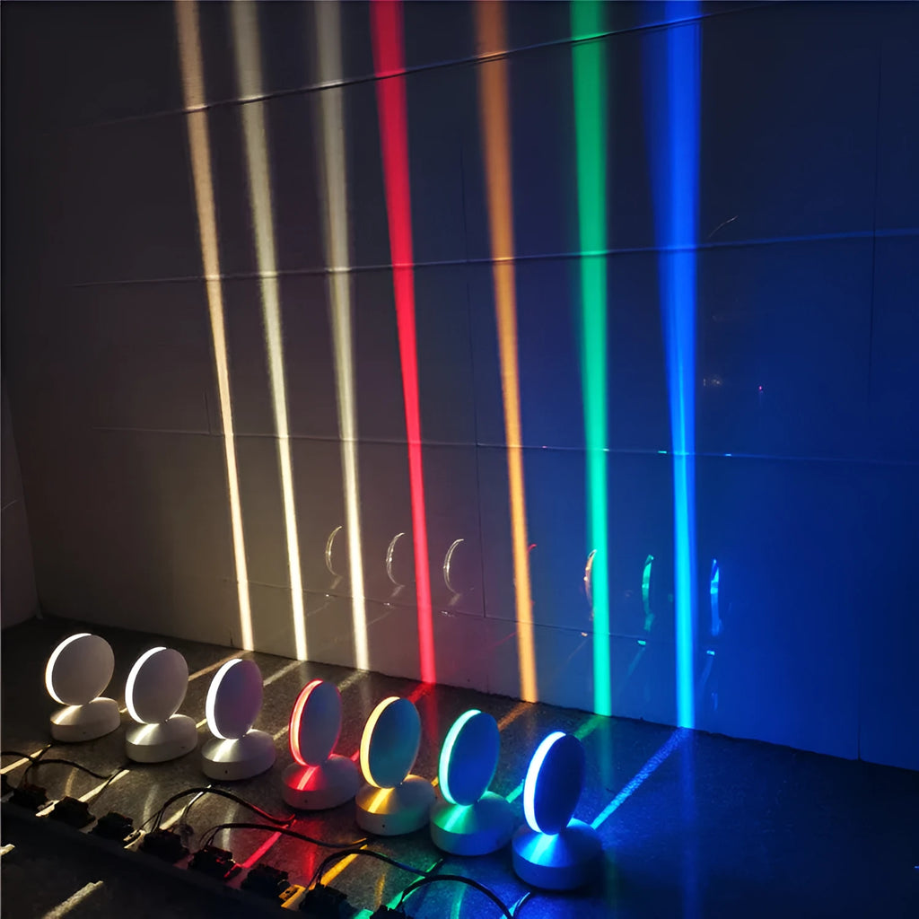 Modern aluminium LED bar wall lamp with glass lens, shown in a corridor setting.