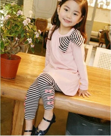 Girl's pink cotton clothing set showing size options from 110cm to 140cm