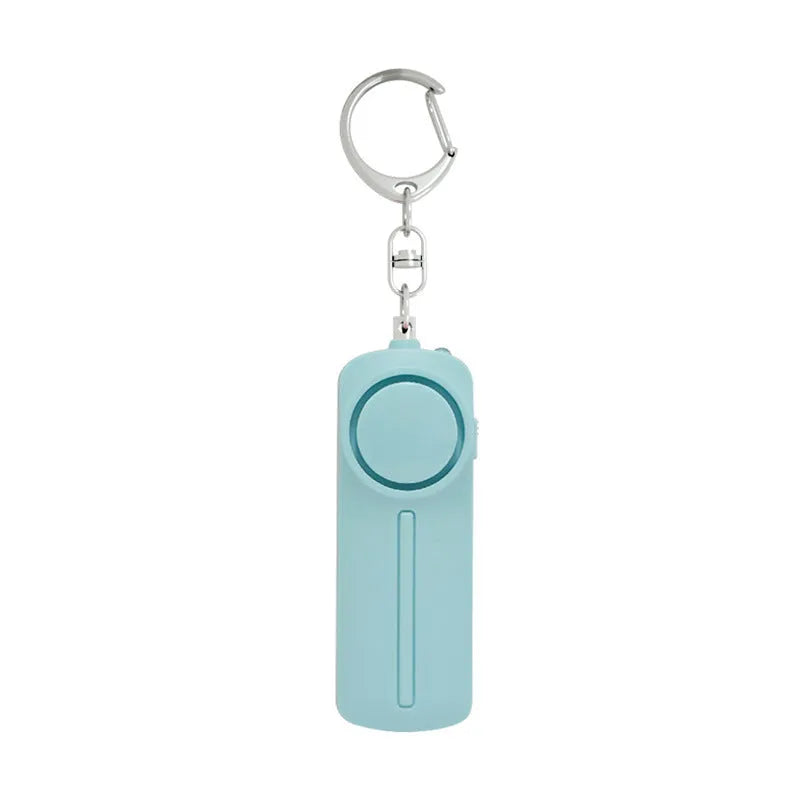 Pink personal safety alarm keychain with activation button showing dimensions.