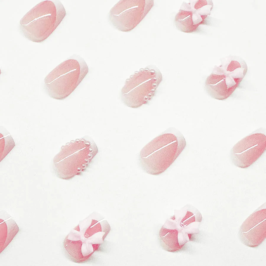 French manicure nail art set with bow, tulip, and starry sky designs on short European square nails