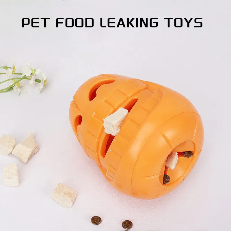 Orange Halloween pumpkin shaped dog chew toy made of durable rubber with a treat-dispensing funnel.