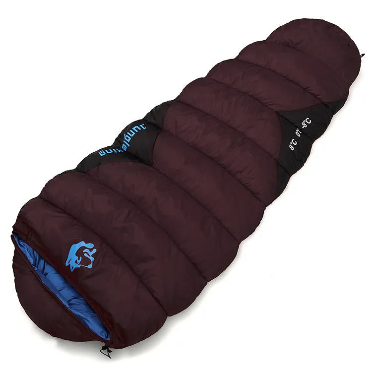 Cotton sleeping bag in Army Green colour compressed inside its storage bag alongside the unfolded sleeping bag.