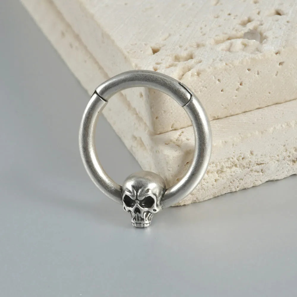 Copper ghost head earrings with punk style in antique gold or silver finish