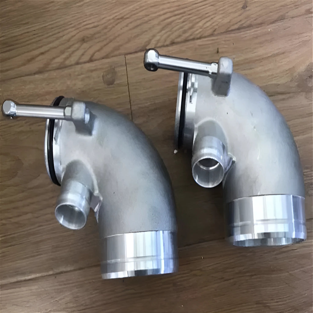 Aluminium alloy 90-degree turbine elbow pipe for lateral engine automotive applications