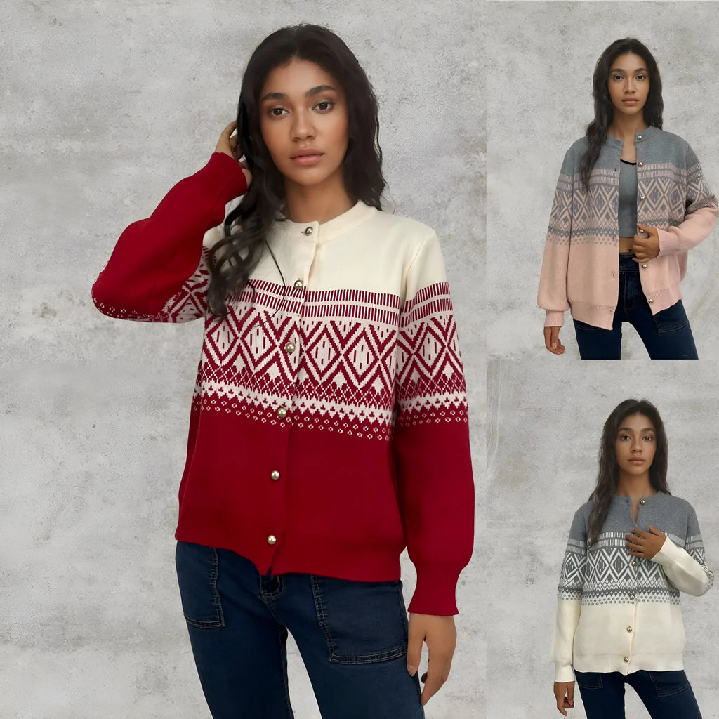 Woman wearing a red alpaca wool cardigan with a diamond knit pattern and long sleeves.