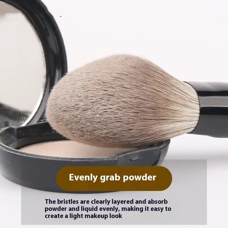 12-piece makeup brush set with wooden handles and a grey PU storage bag