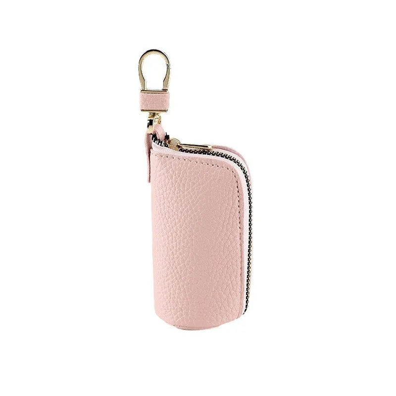 Waterproof PU leather key case in black, grey or pink with zippered expansion compartment