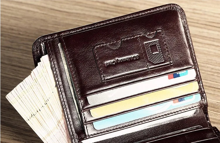 Men's leather wallet open showing photo slot, card holders, banknote section and change compartment