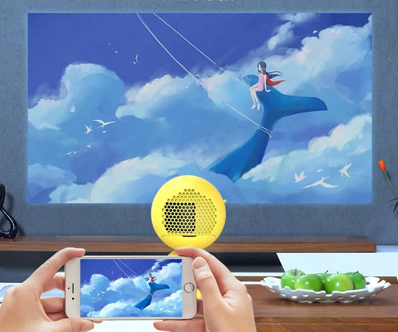 YG220 yellow LED projector showing front projection with 1080P support capability
