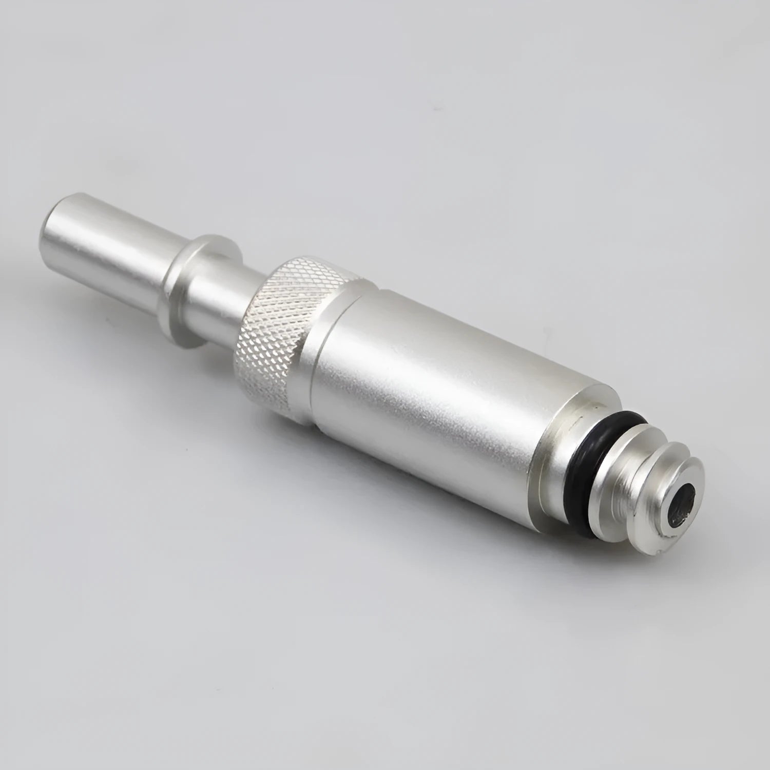 Silver metal VAS6262-9 transmission refueling joint tool on a workshop bench