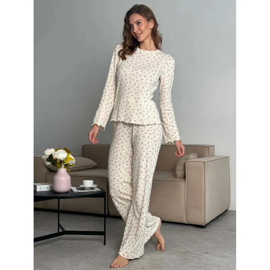 White floral print women's pyjama suit with bell sleeve top and wide-leg trousers