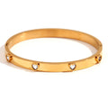 Golden stainless steel bracelet with micro-inlaid peach heart pendant and zircon or diamond accents