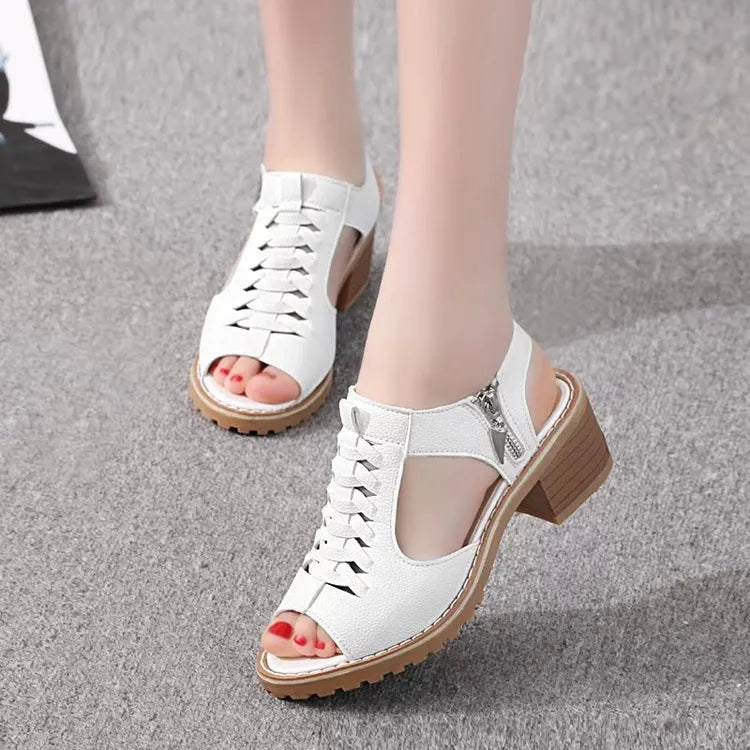 Women's retro sandals in creamy white with a side zipper and mid heel.