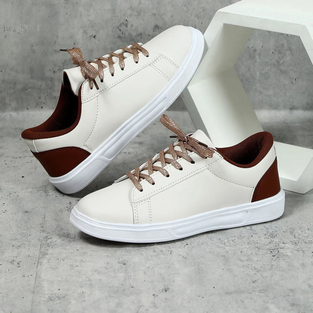 Casual beige brown platform skateboard sneaker with cross strap detail and round toe