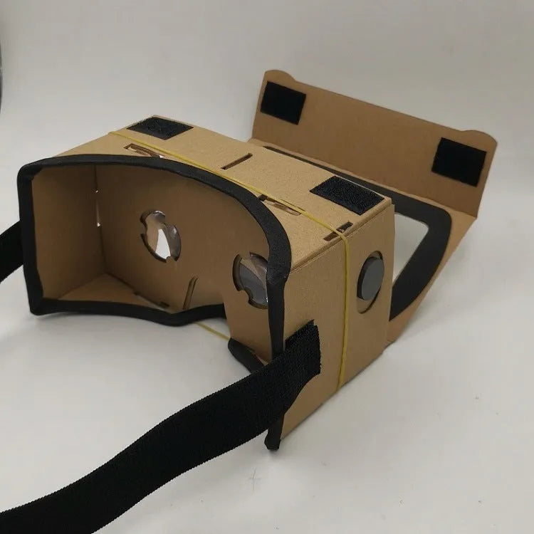 Pink and white VR cardboard glasses viewer for 6-inch smartphones with adjustable head strap.