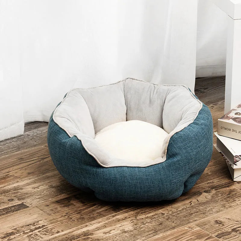 Blue octagonal pet bed with raised sides and a removable mat, for a small dog or cat.