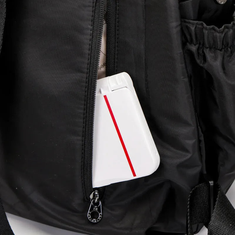Large nylon backpack in black colour showing sandwich pocket design and dimensions