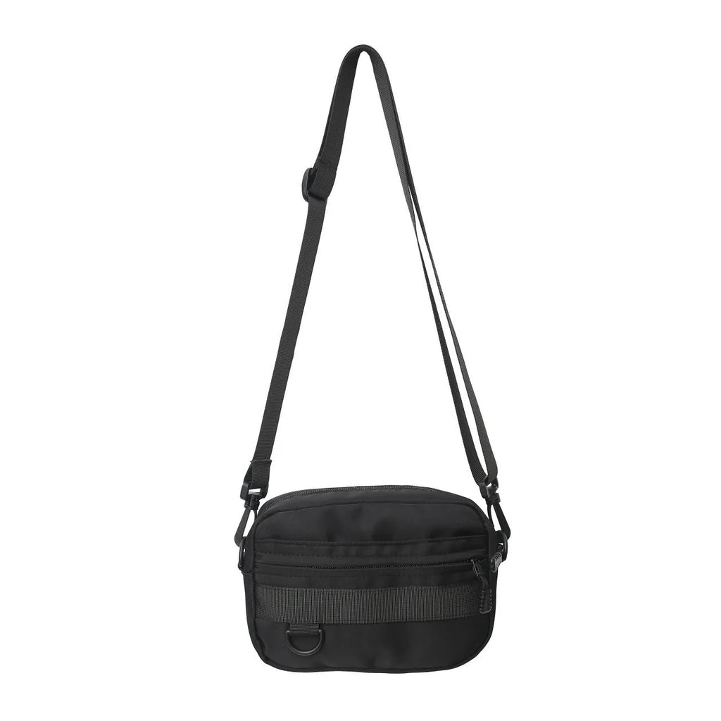 Men's street-style nylon messenger bag in a solid colour with adjustable crossbody strap.