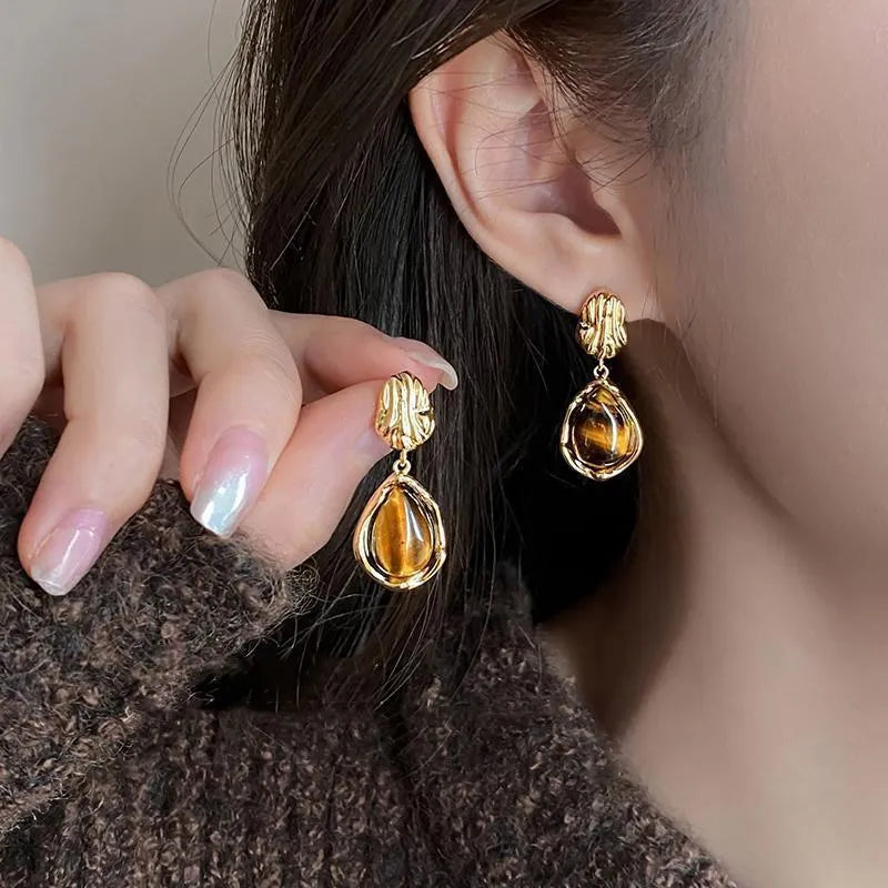 Handmade geometric alloy earrings with tassel elements in three holiday styles