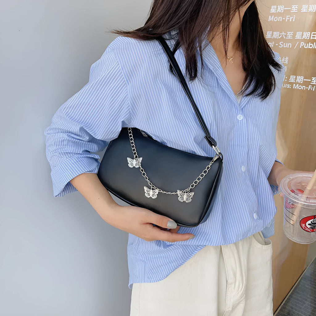 Women's retro style butterfly chain underarm bag in synthetic leather with crossbody strap