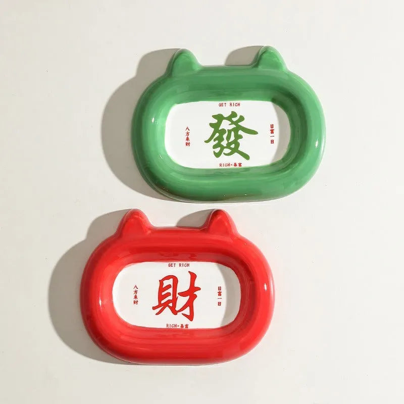 Ceramic pet bowl with an animal design, shown on a table