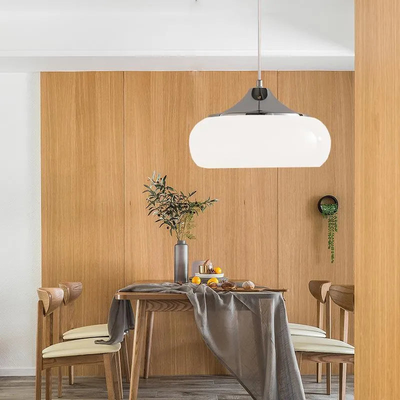 Bauhaus retro style glass pendant ceiling light with three egg tart shaped shades in milk white finish.