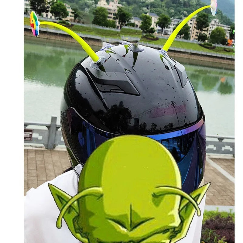 Yellow silicone sunflower decoration with a suction cup base for helmet mounting.