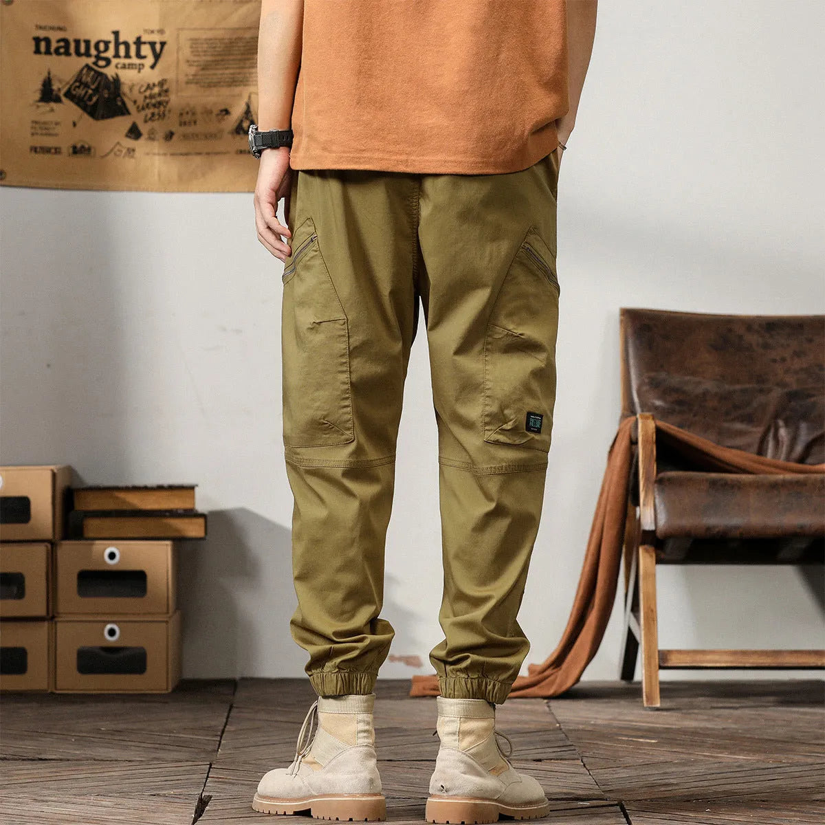 Men's khaki peacock green harem pants with tapered ankle bands and mid-waist design