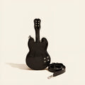 Guitar-shaped black PU leather crossbody shoulder bag showing front design
