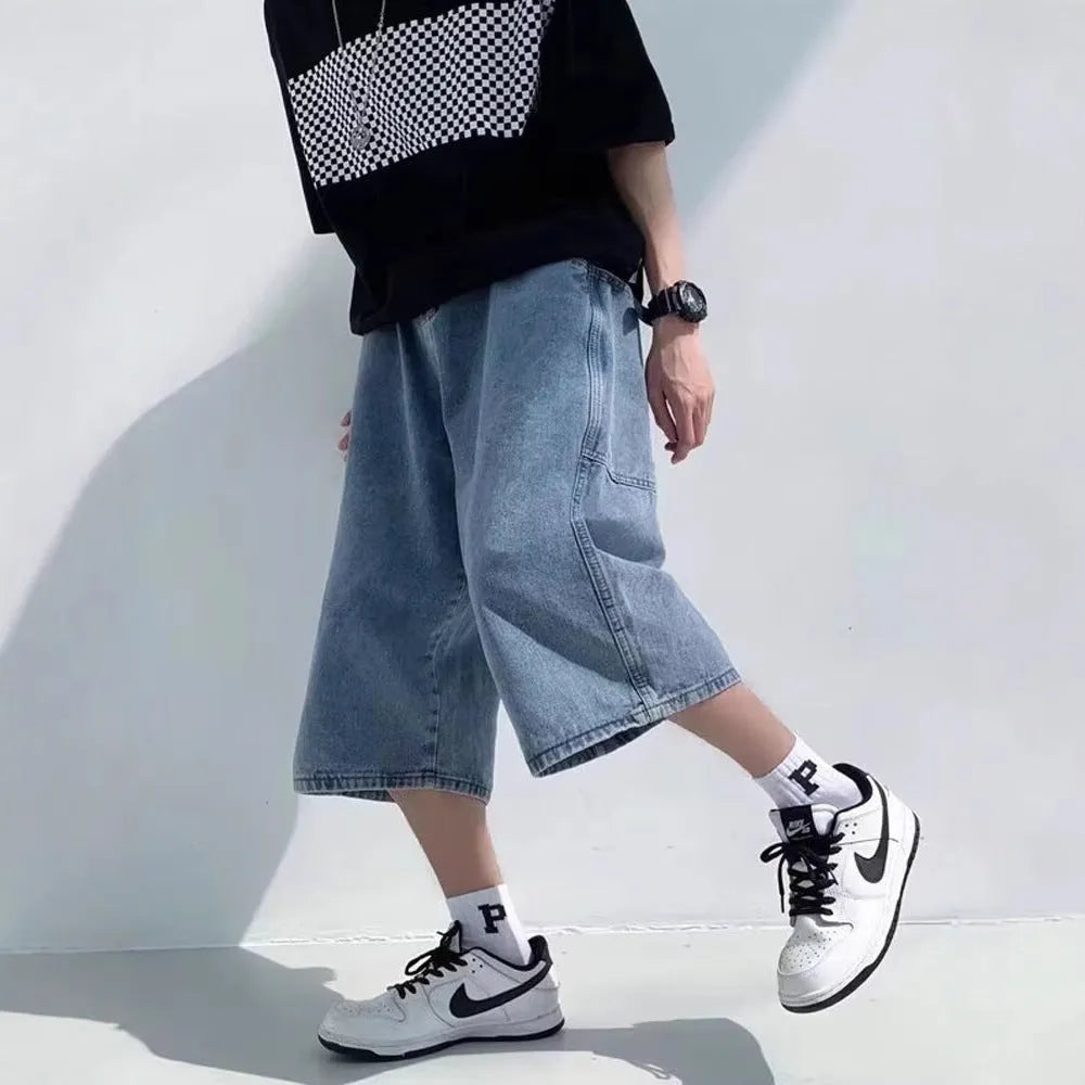 Men's washed blue denim pirate shorts with high-waist and cropped length design