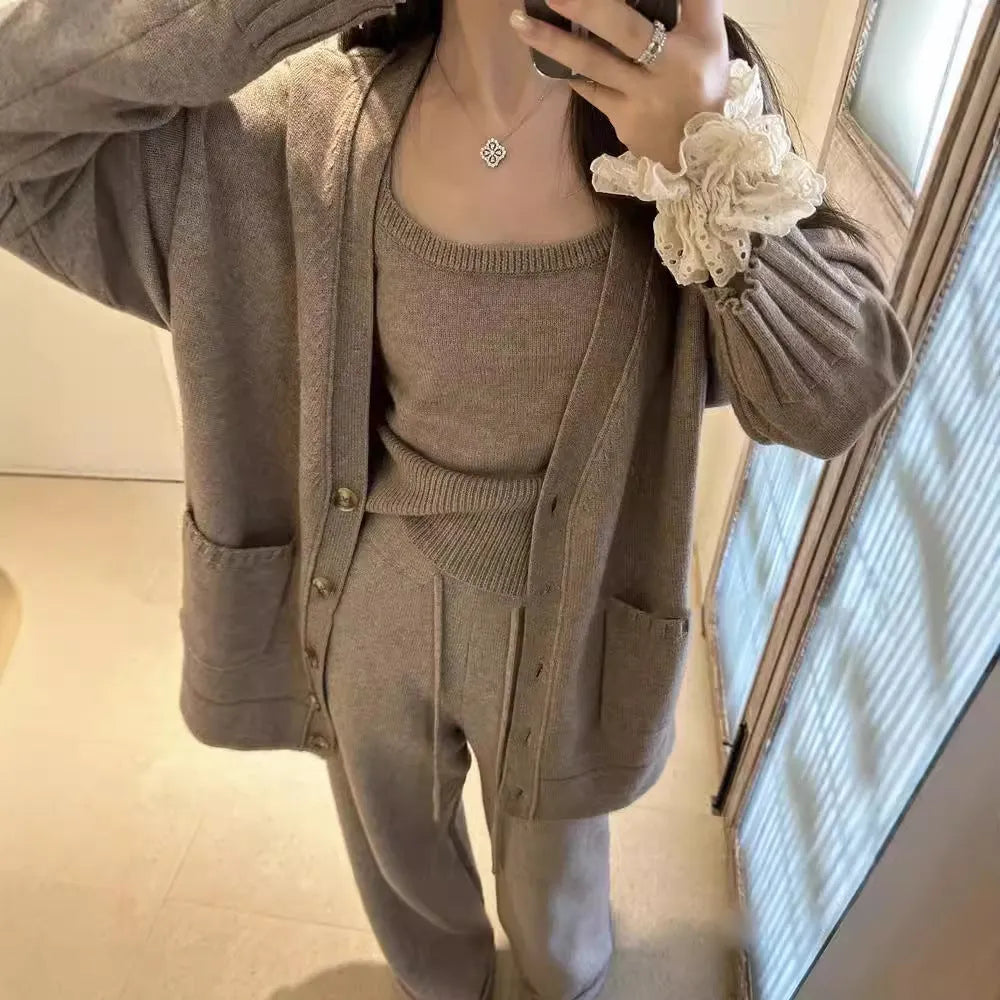 Women's knit three-piece set showing cardigan, vest, and casual pants in loose Japanese Korean style