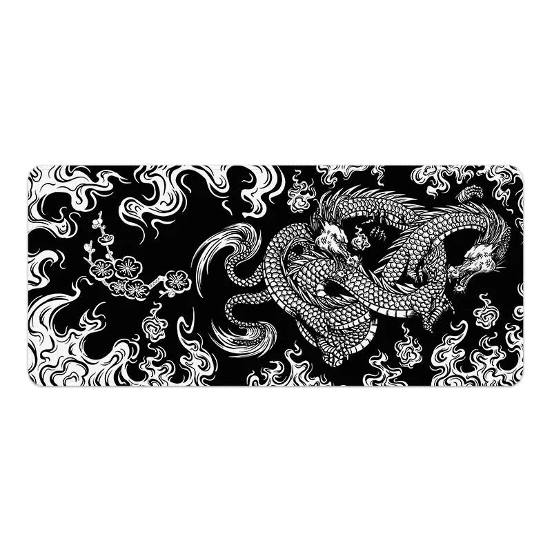 Cloth esports mouse pad with detailed floral dragon design on a desk, showing non-slip base.
