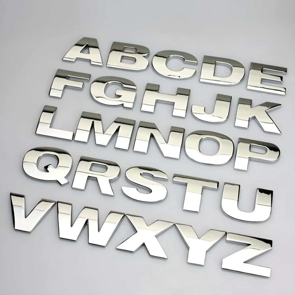 Metal zinc alloy car letter stickers showing dimensional 3D construction in black and silver finishes