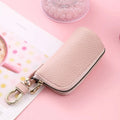 Waterproof PU leather key case in black, grey or pink with zippered expansion compartment