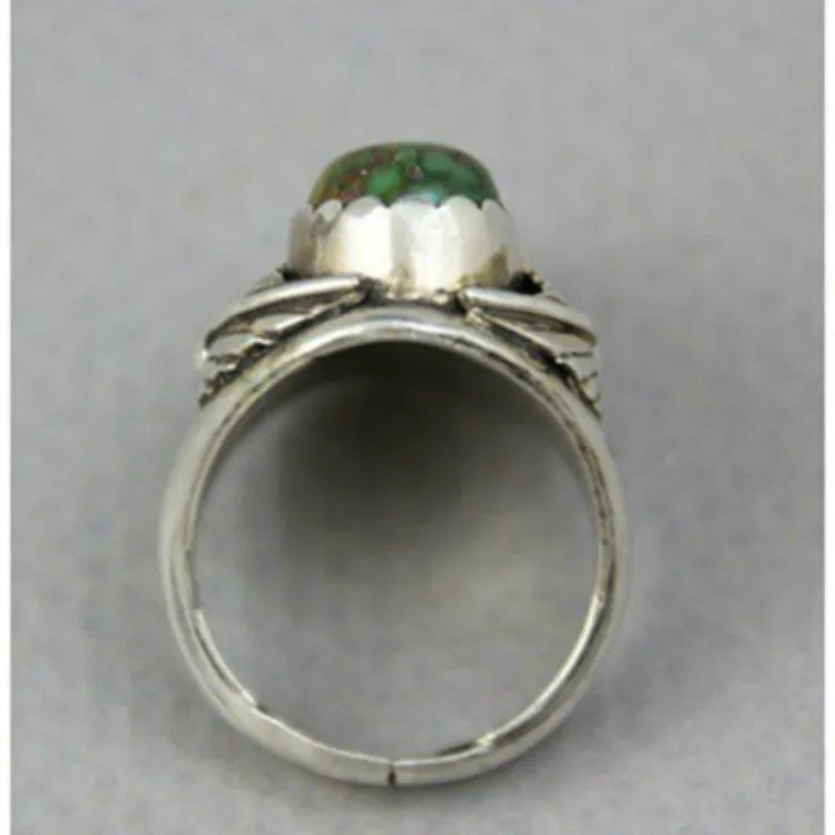 Geometric turquoise women's ring with inlaid detail on alloy band, showing side profile