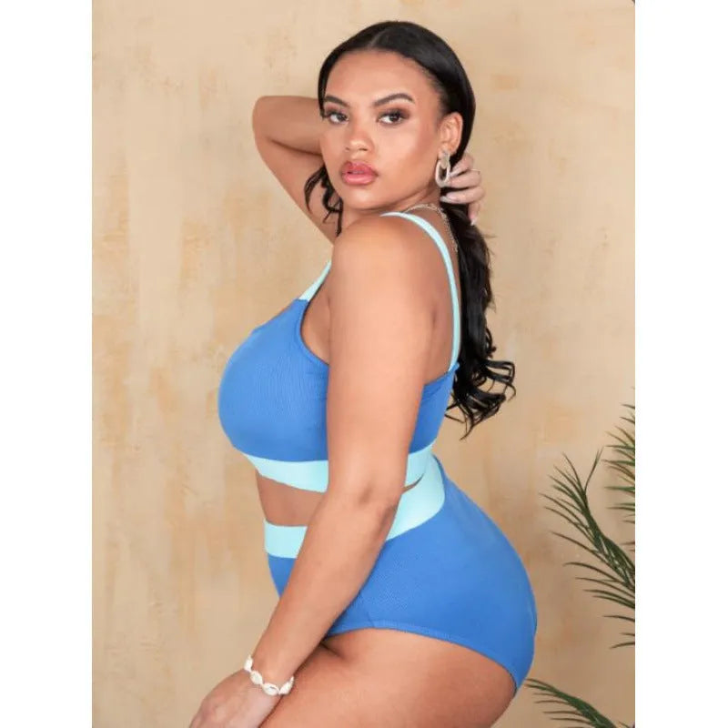 Women's high-waist polyester bikini in solid colour with stitching details, shown in extended sizes