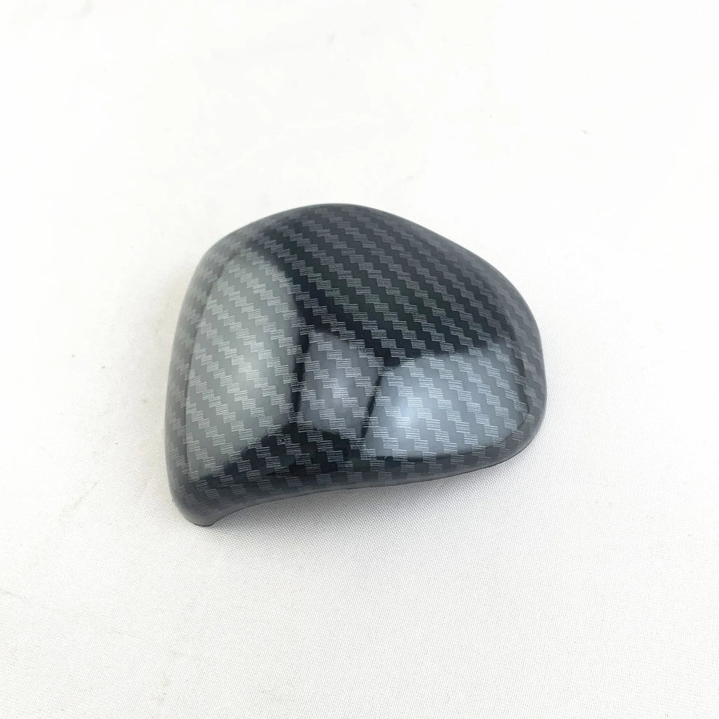 Carbon fibre pattern ABS plastic gear shift cover for Smart RunK3 manual transmission.