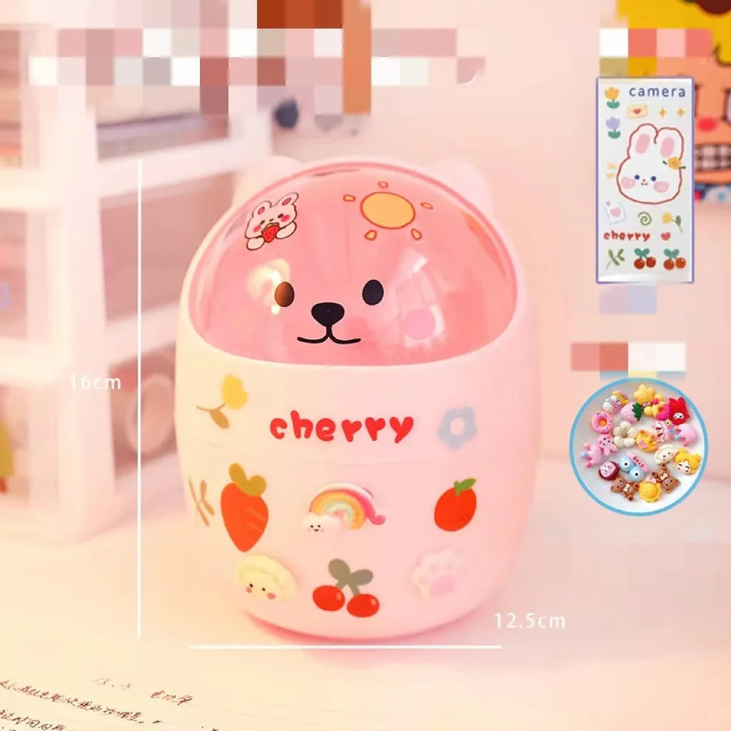 Plastic mini bear shaped desktop trash can with press-type lid in beige gray, includes stickers and garbage bags