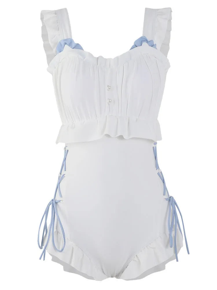 Milky white women's backless one-piece nylon swimsuit laid flat, showing sleeveless design.