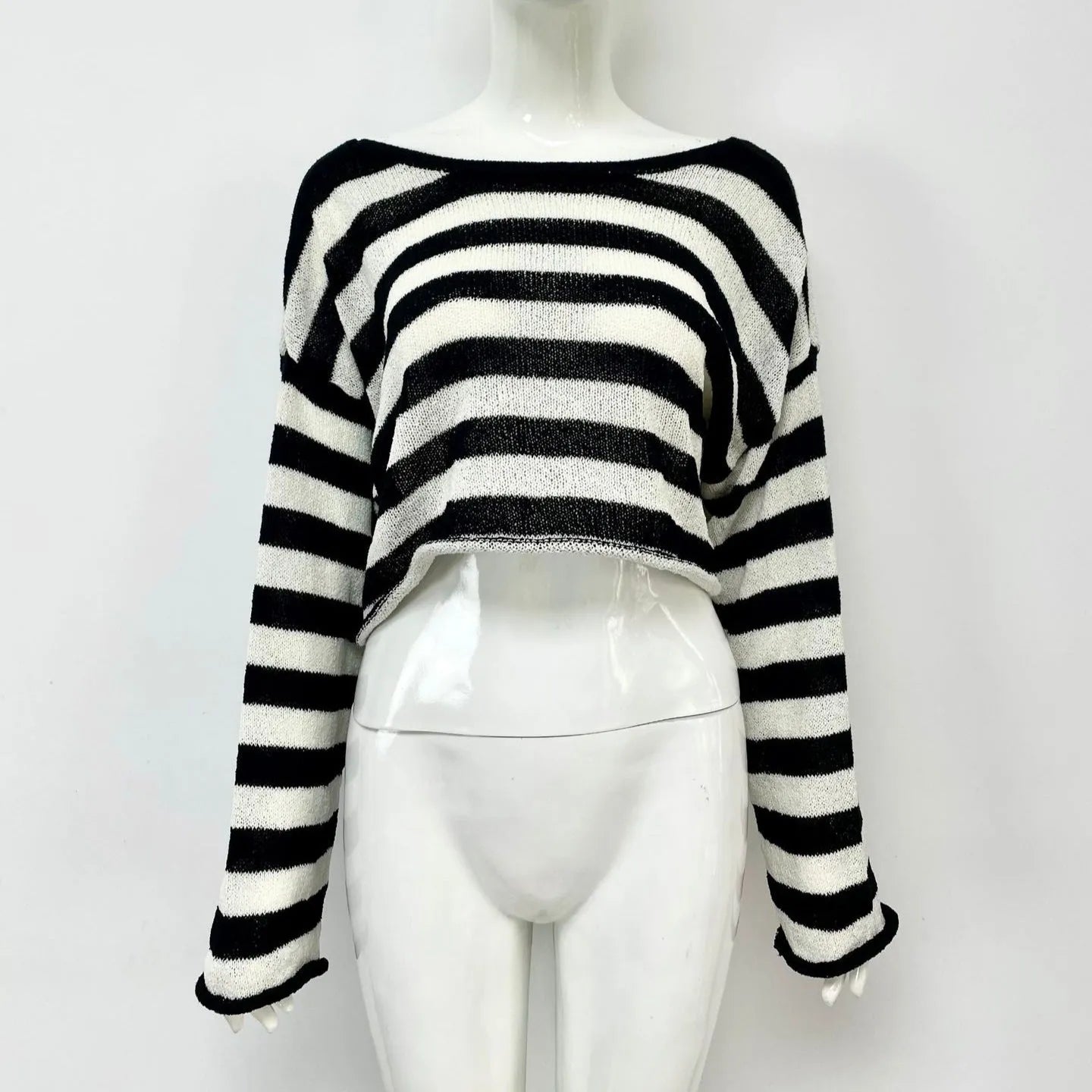 Striped long-sleeved pullover sweater in mercerised cotton, shown in blue with an exposed navel design.