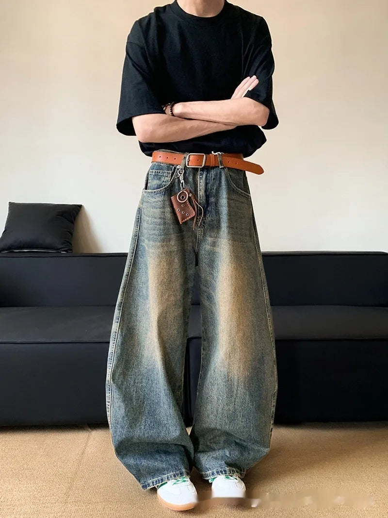 Men's retro blue distressed jeans with wide-leg cut and micro-elastic cotton blend fabric
