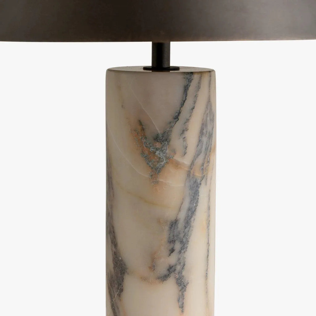 Black modern marble table lamp with minimalist design on wooden surface