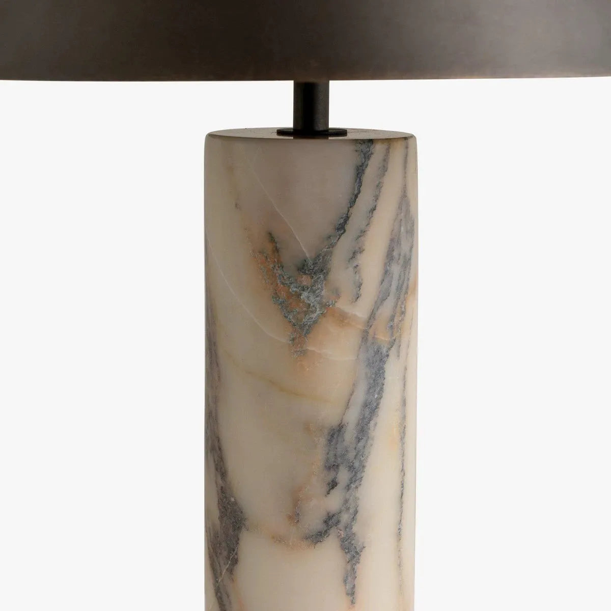 Black modern marble table lamp with minimalist design on wooden surface