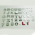 Metal zinc alloy car letter stickers showing dimensional 3D construction in black and silver finishes