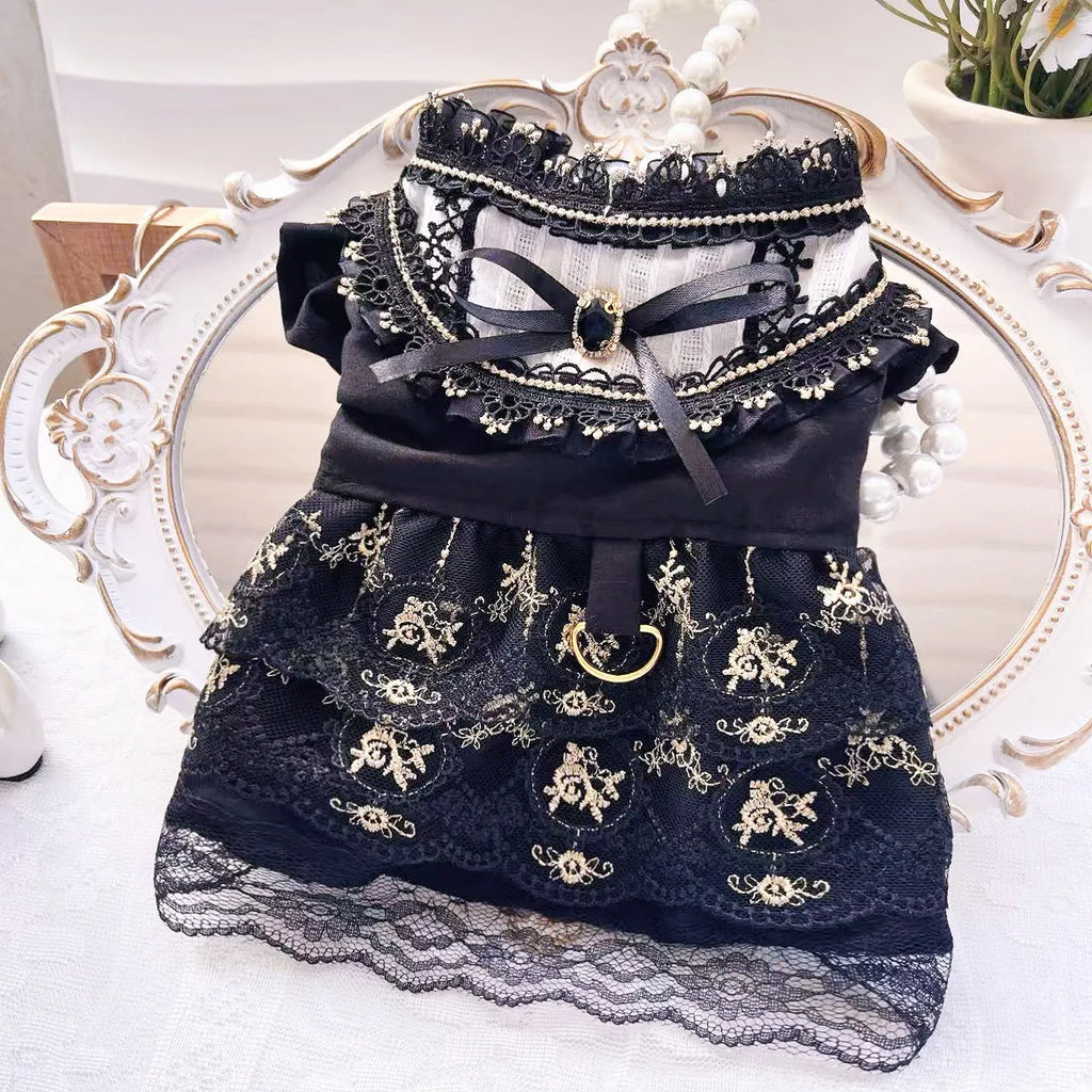 Golden gothic princess-style dress for a small dog or cat on a mannequin.