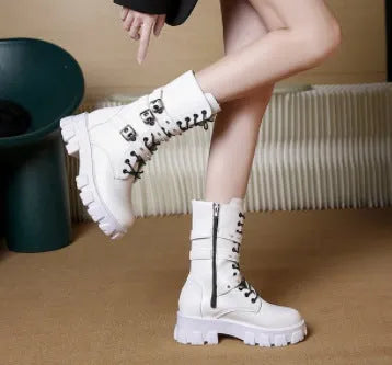 Women's black mid-calf knight boots with metal buckle and side zipper on a white background.