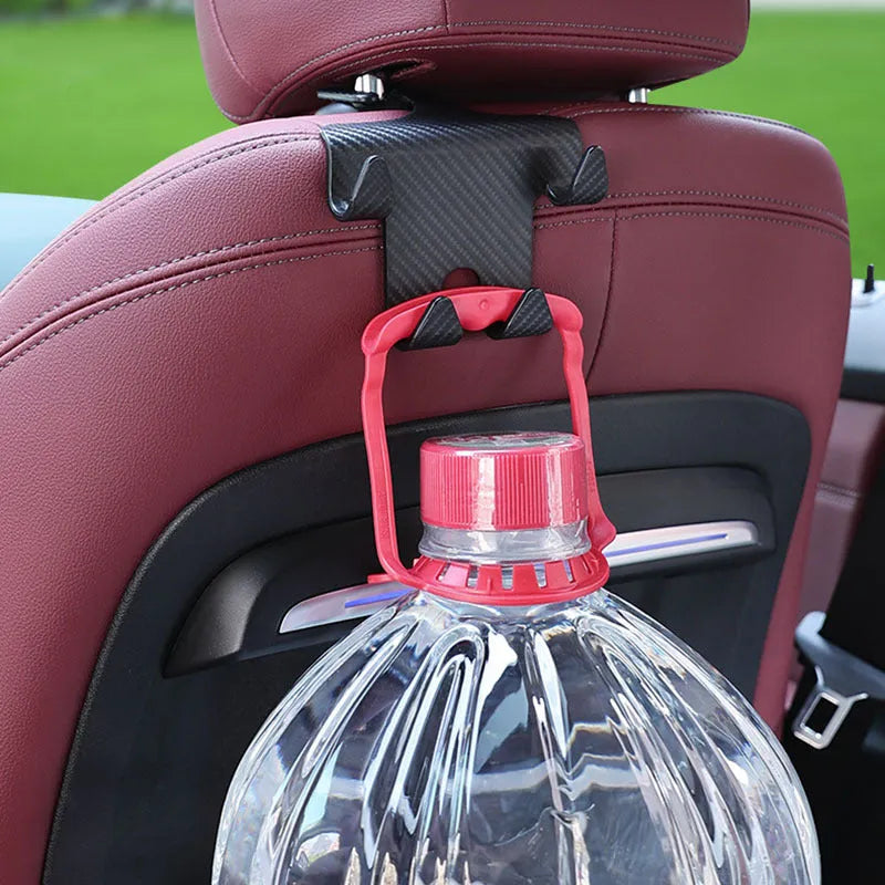 Black ABS plastic car hook with integrated phone holder bracket for rear seat organisation.