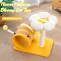 Yellow multi-level cat climbing frame with sisal scratching posts and a central tunnel.
