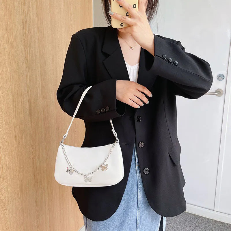 Women's retro style butterfly chain underarm bag in synthetic leather with crossbody strap